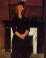 Mujer sentada junto a una chimenea 1915 Amedeo Modigliani